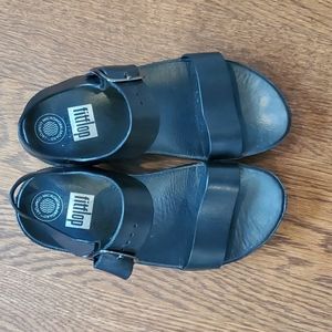 Fitflop black sandals in size 5. Very comfy for walking.